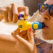 Hot girl smoking from MINION SILICONE HAND PIPE